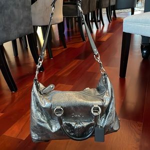 Coach metallic silver with teal lining